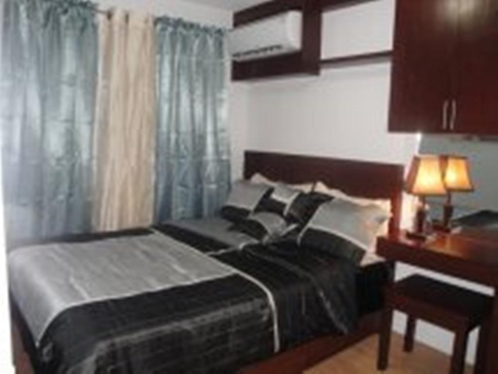 The Oasis Davao Condotel Szoba fotó